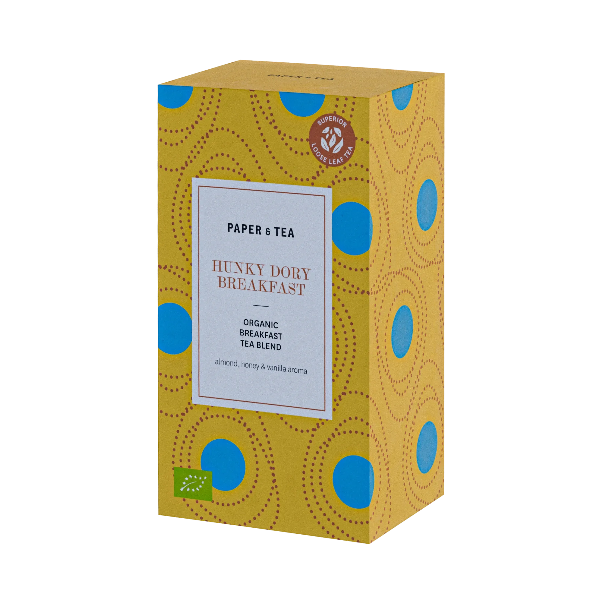 Gelb-blau gemusterte PAPER & TEA Verpackung, HUNKY DORY BREAKFAST Tee, biologisch mit Mandel, Honig, Vanille.